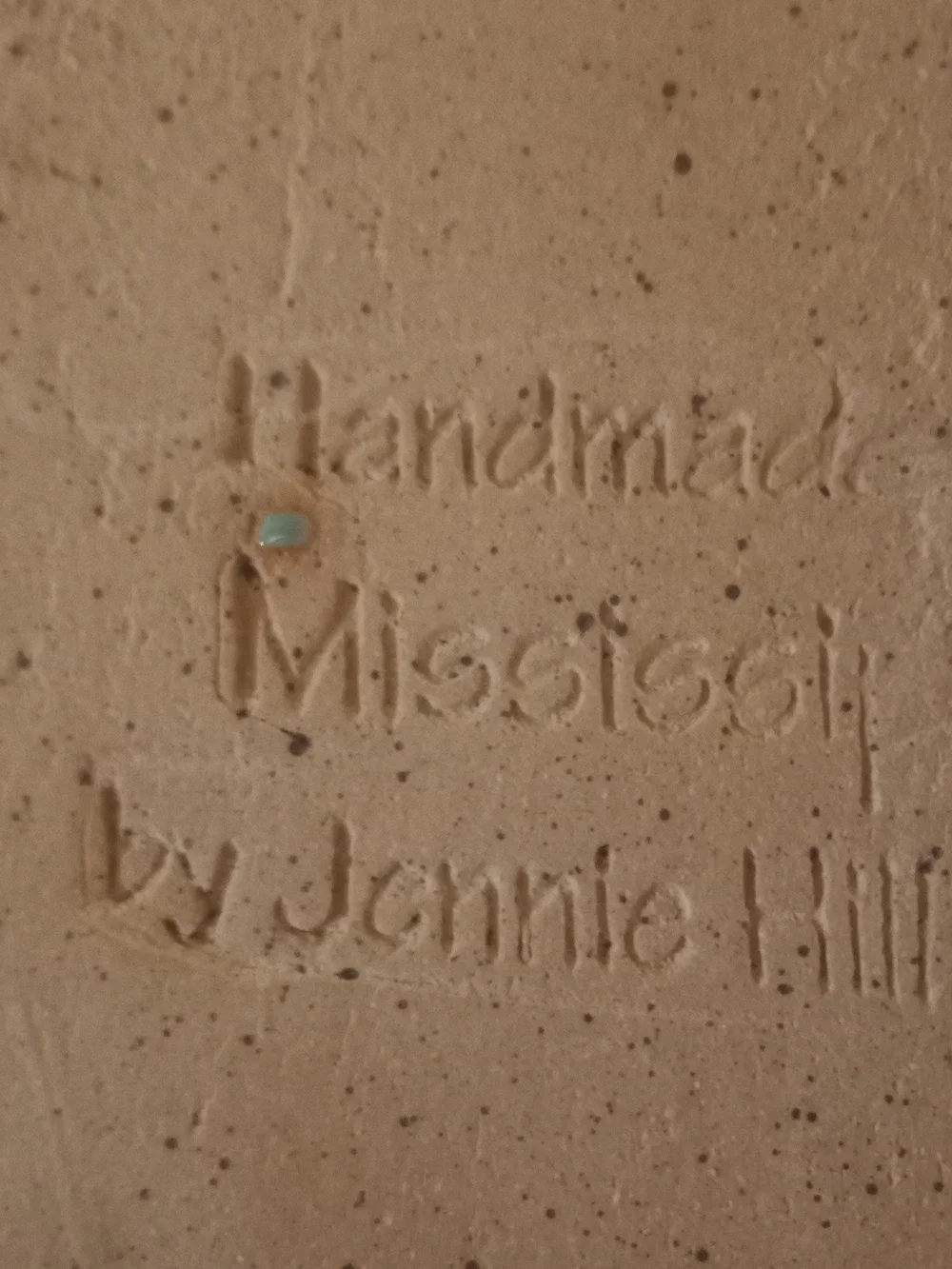 Decorative Ceramic Wall Tile with Turquoise Center and Ornate Brown Border